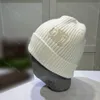 Gorro de lã de malha de designer chapéus bordados masculinos e femininos gorros de malha térmica de inverno gorro de marca de esqui gorro de caveira bonés quentes de luxo acessórios vermelhos