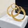 Hoop & Huggie Gold vintage hollow plain back interlocking pattern large circle earrings, jewelry designers design simple individual pieces, gifts Valentine's Day