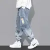 Dżinsy męskie jeansy jesienne druk w lupgy hip hop men men cargo spodni streetwear graffiti dżinsowe spodnie 230725