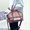 Duffel çantalar büyük kapasiteli kadın çanta moda şerit tuval deri lüks kadın üst tutamak çanta retro ofis bayan omuz