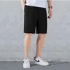 Shorts pour hommes HCXY marque hommes été pour hommes lâche panneau lumineux coton éclaté cinq points pantalon jeunesse couleur unie