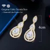 Stud CWWZircons brillant blanc zircon cubique boucles d'oreilles goutte d'eau pour les mariées mariage soirée Costume bijoux accessoires CZ904 230725