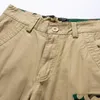 Мужские шорты 2023 Высококачественные камуфляжные грузы для мужских многокачественных бермудских коротких штанов