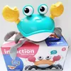 Animaux de compagnie électroniques pour enfants de luxe à la mode rampant crabe musique sonore rougeoyante induction automatique montée crabe sagesse cadeau jouets