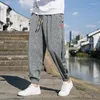 Herrbyxor harem retro jogging tröjor hip-hop lös gata beat hajuku stil casual svart och grå 5xl