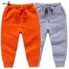 Byxor detaljhandelsförsäljning Bomullsbyxor för 2-10 år gamla Solid Boys Girls Casual Sport Pants Jogging Enfant Garcon Children Barn Byxor 230725