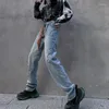女性のジーンズパンクガールズファッションのトレンドは女性のためにリッピングされた日本のハラジュクストリートウェア10代のゴシック様式の服を着た脚デニムパンツ