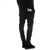 Pantaloni da uomo New Black Strappato Skinny Hip Hop Swag Denim Jeans da motociclista graffiati Pantaloni da jogging Famosi pantaloni da uomo firmati 210318 L230726