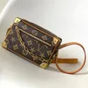 Totes mini yumuşak gövde M44735 El Çantası Omuz Lüksler Tasarımcı Kutu Debriyaj Çantaları Kahverengi Çiçek Zinciri Fashio Erkekler Gerçek Deri Pochette Çapraz Vücut Sling Çantaları