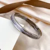 Ein klassisches Diamant-Charm-Armband, Designer-Armreif, Modeschmuck, massive Goldmanschetten, Edelstahl-Kristall-Schlangenarmreifen, Schmuck für Frauen