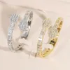 Bangle Bangle 2023 All'ingrosso Pieno pavimentato Iced Out Bling 5A Cubic Zirconia CZ Hamsa Mano aperta Hip Hop Donna Uomo Gioielli braccialetto di fascino