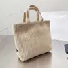 Women Brand Borse Brand Borse Straw Weave Ladies Bagna per vacanza di grande capacità BASSE BEACK FEMLES BASSE CASA CASA STRIPSE 0818