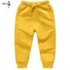 Byxor detaljhandelsförsäljning Bomullsbyxor för 2-10 år gamla Solid Boys Girls Casual Sport Pants Jogging Enfant Garcon Children Barn Byxor 230725