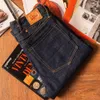 Mäns jeans röda tornado avsmalnande vintage selvedge denim slim n benbyxor 230725