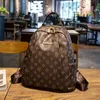 Simple fashion Europe and the United States retro letters printed ladies soft leather backpacks 0731