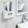 Soportes para cepillos de dientes ECOCO Montaje en pared Exprimidor automático de pasta de dientes Soporte para dispensador Accesorios de baño Estante de almacenamiento con 4 tazas 230725