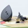 Oryginalne bezprzewodowe ładowce myszy pionowe przewodowe myszy USB Ergonomiczne świetliste 2,4G Mute fotoelectric Bluetooth Game Mysz