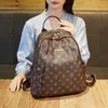 Moda simples Europa e Estados Unidos letras retrô impressas mochilas femininas de couro macio 0731