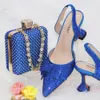Отсуть обувь QSGFC 2022 Итальянский дизайн моды R.Blue Glass Heel Обувь Ladies Ladies и украсить кристаллами Свадебные сумки с двойным использованием.