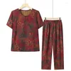 Kvinnors tvåstycksbyxor 2023 Summer Kvinnor Ice Silk Elasticitet Kort ärm Set Set Large Size medelålders Mother Floral Print Clothes Two-Piece