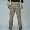 Herenbroeken Combat Broeken Heren Tactische Militaire Cargo Jogger SWAT Legerbroeken Mannelijke Multi-pocket Waterdicht Slijtvast Wandelen Joggers L230727