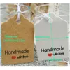 Weihnachtsdekorationen 100 Stück MTI Niedliches braunes weißes Papier Geschenketikett Tag Handgemachter Schmuck Charms Runde Gefälligkeiten Dekorativ Drop Lieferung H Dhmsd