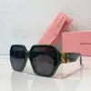 Designer Able Metal Oval Small Frame Miu Solglasögon för män och kvinnor vilda utomhusgatan fotografering solglasögon för förare affärssolglasögon