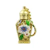 Wholesale mini Perfume Bottles 3ml Empty Refillable Essential Oil Bottles Enamel Flower Middle East Perfume Bottle with Key Ring