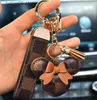Keychains Lanyards Designer Keychain Wallet Keyring Purse Pendant Car Chain Charm Bucket Bag Flower Mini Coin Holder Trinket Gifts Accessories T230727