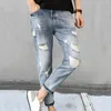 Calça jeans masculina streetwear elegante cor gradiente com furos canelados ajuste fino multibolsos costura durável para longa duração