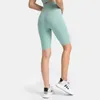 L184 Leggings curtos de cintura alta Sem shorts de ioga femininos Shorts esportivos de cor sólida Calças elásticas fitness para treinamento com ajuste clássico de cinco pontas