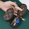 Porte-clés Lanyards Clés de voiture Sac Anneaux Brown Fleur Plaid Pu Cuir Gold Metal Keyrings Titulaire Pendentif Charms Fashion Design Pochettes Bijoux Cadeaux T230727