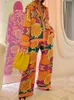 Женские брюки с двумя частями набор костюмов 2 часа, которые женщины, расположенные в рукаве с одним пуговицей, цветочная печатная рубашка, блуза, брюшные брюки, пружинный костюм 230726