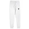 Män avslappnade sportbyxor damer mode street stil byxor mäns dagliga slitage bekväma tröjor unisex fast färg joggar chg2307276