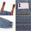 Jeans da donna Abito da donna in denim allentato Abiti da donna strappati con cinturino per spaghetti femminili con fori sbiancati