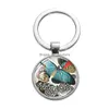 Porte-clés Longes Nouveau Vintage Papillon Bleu Porte-clés En Verre Cabochon Sier Plaqué Porte-clés Fleur Imprimer Femmes Élégantes Fille Bibelots Dhqbl