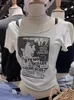女性用TシャツアニメプリントビンテージTシャツ女性カジュアルサマーホワイトラウンドネックショートスリーブ生裾ティーY2Kストリートウェアコットントップ230727