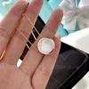 Designermärke TIFFAYS Pure Silver Necklace Pearl Round Cake Pendant Light Luxury Plating 18K Gold Female White Fritillaria Small Diamonds Clavicle Chain Chain Chain