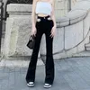 Женские джинсы Полая цепь черная вспышка грузовые джинсовые брюки с высокой талией тонкий бутк -колокольчик нижний корейский женские женщины сексуальные готические брюки Y2K