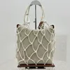 Designer Mesh Beach Bag Luxury Summer Straw Tote Bag Pink White Women Handväska Mesh Hollow Woven Hot Shopping Väskor Stickning Totes