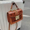 2023 Top Design Luxury Bags haute qualité texture portable épaule petit carré populaire imprimé messager selle