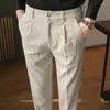 Pantalon homme automne hiver 2023 couleur unie épais velours côtelé affaires bouton mode Stretch décontracté mâle vêtements N69