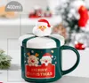 Der neueste 13,5oz -Weihnachts -Keramik -Becher mit Deckel Spoon Cup -Set, viele Stiloptionen, unterstützen Sie das kundenspezifische Logo