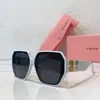 Designer Able Metal Oval Small Frame Miu Solglasögon för män och kvinnor vilda utomhusgatan fotografering solglasögon för förare affärssolglasögon