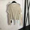 23FW Maglioni da donna Maglieria Top firmati con fiocco Jacquard ricamato Sfilata di fascia alta Designer di marca Crop Top Camicia a maniche lunghe Elasticità Capispalla casual