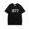 Camisetas masculinas masculinas femininas Designer de moda Ess tshirt Street Casual fog T-shirt de manga curta 1977 Camisa de impressão estéreo de algodão S-XL