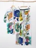 Dwuczęściowe spodnie damskie garnitur damski swobodny luźne graffiti drukowana jedwabna koszula dwuczęściowa wysoka talia szerokopasmowa spodni Kobiet Letni Set z krótkim rękawem 230727