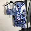 Tenue d'été Designer Gilet Deux Pièces Ensemble Femmes Vêtements Mode Camisole Débardeur Céladon Imprimer Bleu Taille Haute Jupe Droite Slim Jupes Élégantes Costumes Femmes