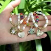 Pulseras con dijes Bohemia con incrustaciones de diamantes de imitación amor corazón colgante pulsera para mujer personalidad esmalte conchas cuentas joyería