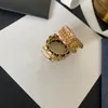 Designers Brand Letter Ring Hollow Out Star Anillos de banda de cobre chapados en oro de gama alta Diseñador de moda Anillo de lujo para mujer Regalos de joyería de boda Tamaño: 7